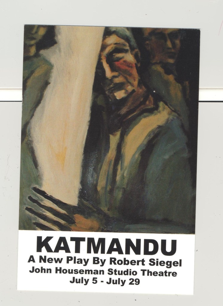 a man leaning against a wall